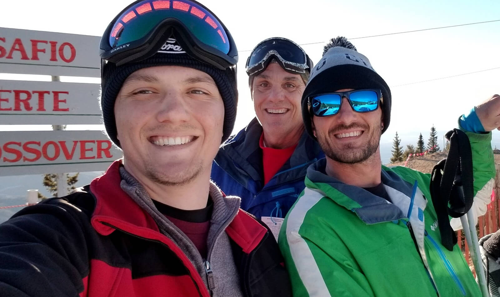Luke and family taking a selfie out on the slopes after skiing. 