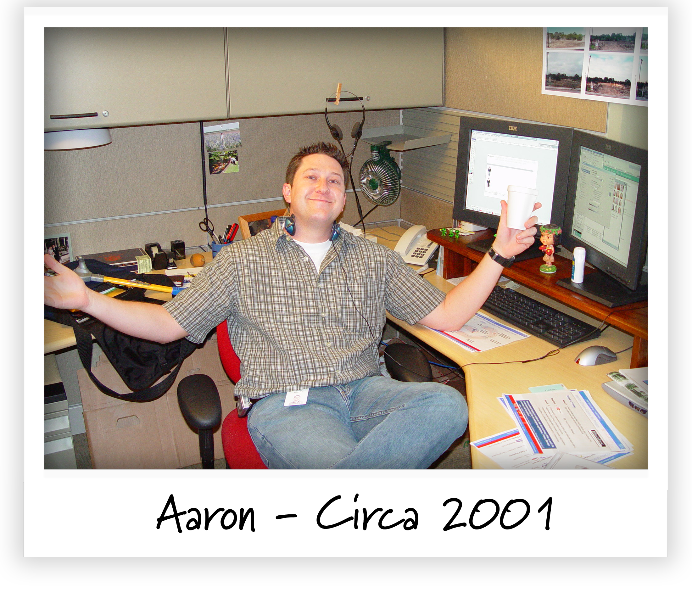 Aaron Bramwell sitting in a cubicle