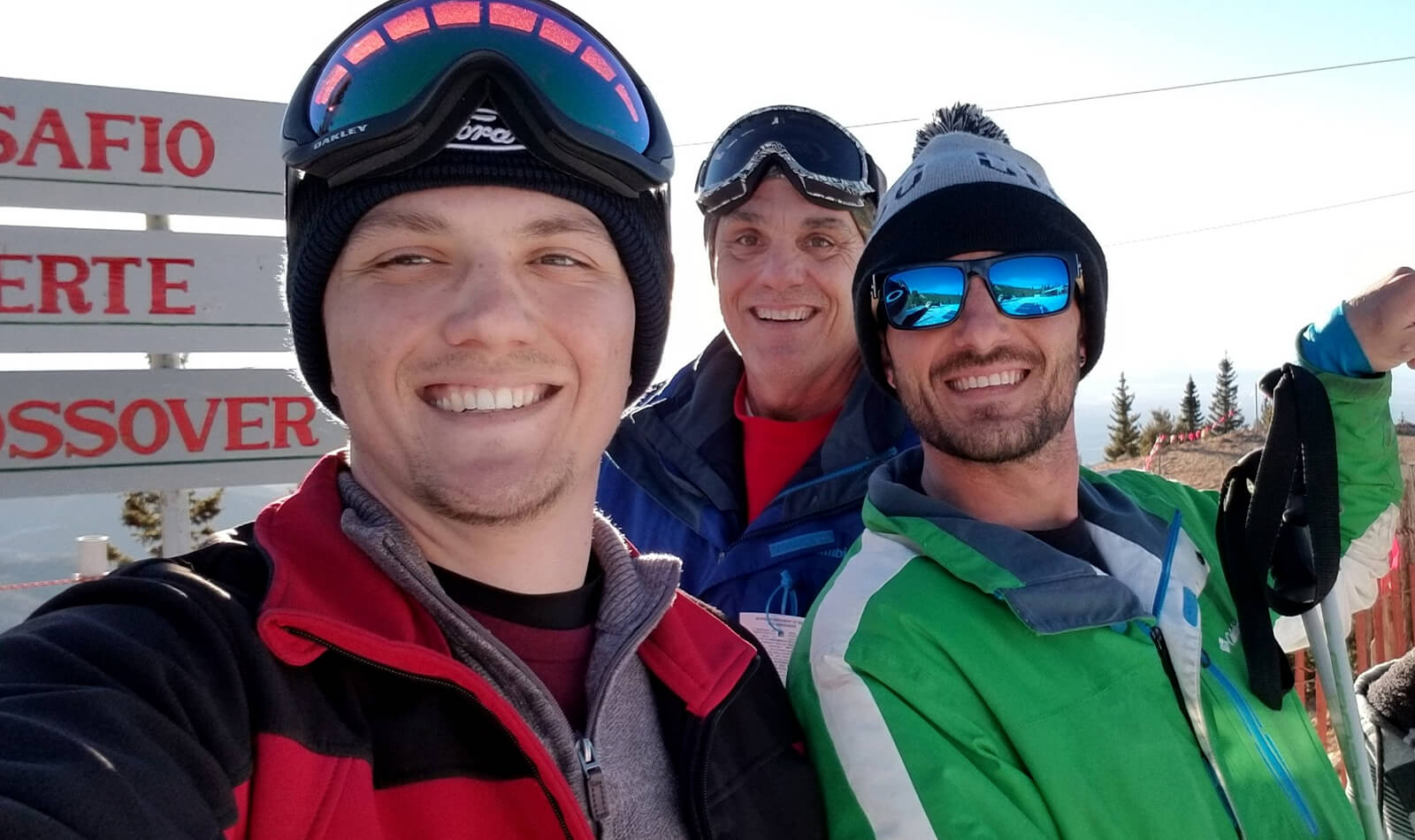 Luke and family taking a selfie out on the slopes after skiing.